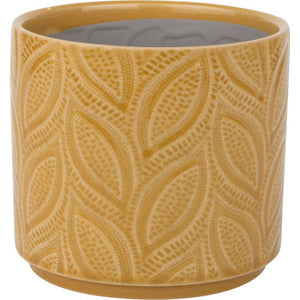 yellow ceramic pot with leaf imprint